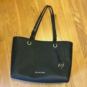Brand new condition, never used, can fit a laptop, 2 zipper sections inside